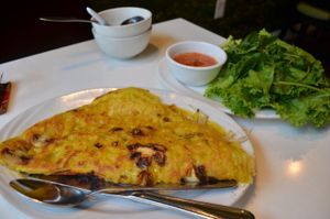  Banh Xeo vietnamese pie filled with mushrooms, tofu, mock meat, soy sprouts. Served with lettuce, fresh herbs and sauce at Golden Era Vegan Restaurant in San Francisco