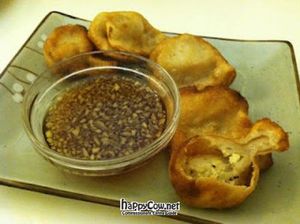 Tofu and veggie pot stickers with soy and ginger sauce at Golden Era Vegan Restaurant in San Francisco