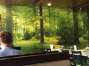 Nice mural adds to the ambiance  at Golden Era Vegan Restaurant in San Francisco