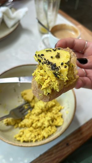 Toast with scrambled tofu and avocado   at Alimentos da Vila in Salvador