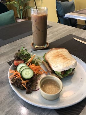 Vegan pesto sandwich and iced almond milk latte at Nourish in Chiang Mai
