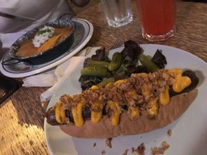 Hot dog and savory pancakes stuffed with mushrooms at Szabad Bisztro in Budapest