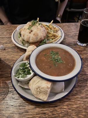 Goulash (front) and chicken burger (behind)  at Szabad Bisztro in Budapest