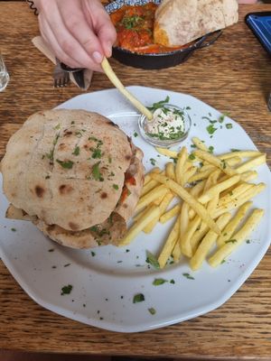 The burger menu with baked cabbage and avjar on flatbread with homemade mayo at Szabad Bisztro in Budapest