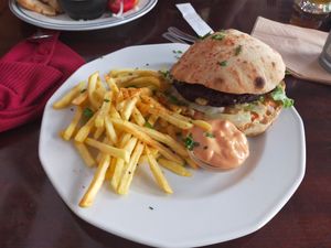 Burger with chips at Szabad Bisztro in Budapest