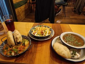 The vegan goulash (right), loaded fries (middle) at Szabad Bisztro in Budapest