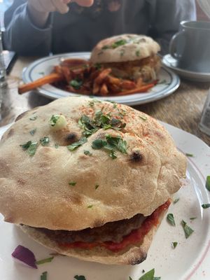 Balkan Burger, Pulled “Pork” sandwich, and carrot fries at Szabad Bisztro in Budapest