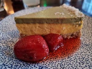 Pistachio-mango cheese cake with strawberries at Szabad Bisztro in Budapest