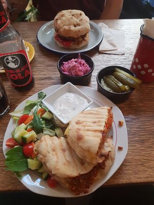 Toasted sandwich and beyond meat burger with pickles and coleslaw at Szabad Bisztro in Budapest