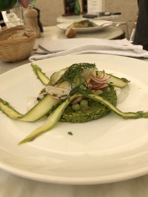 Minted pea pattie with fresh, steamed vegetables  at Les Trois Lys in Condom