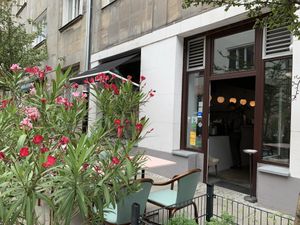 Outdoor seating at MOD Donuts in Warsaw