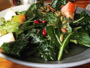 Kale and pomegranate salad made vegan  at Greens Restaurant in San Francisco