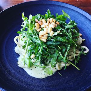 Meyer Lemon Pasta with Mint Pesto, Fava Beans, Wild Arugula, and Toasted Pine Nuts  at Greens Restaurant in San Francisco