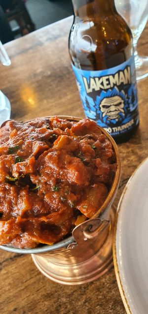 Eggplant and mushroom 'special'. 
swapped the Naan for a roti as Naan contained ghee. Very rich, thick tomatoey gravy. Asked for V V Hot and it was pretty much bang on! at Indian Affair in Taupo