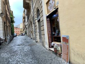 outside at Mizio's in Rome