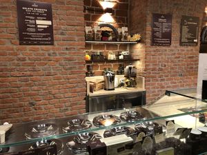 Gelato station & menus for gelato, smoothies & drinks (see plaques on the wall) at Grezzo Raw Chocolate in Milan