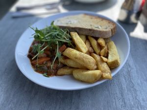 Vegan bean chili with garlic bread and chips - Granny Dowbekins Tearooms, Pooley Bridgee  at Granny Dowbekins Tearooms in Penrith