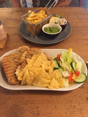 ‘Cheese’ & mushroom toastie on homemade bread, and tofish & chips  at Ultimate Vegan Cafe in Lichfield