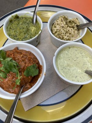 Vier vegane Dips: Green Zhoug, Hummus, Muhammara, Joghurt-Zitrone  at Kate's Joint in Copenhagen