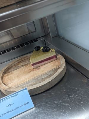 pistachio mousse raspberry raw cake at Plantmilkyway in Budapest