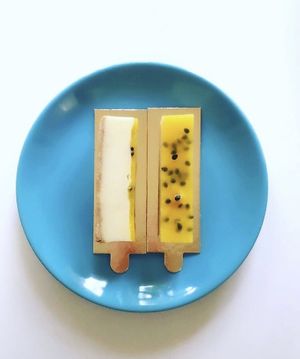 Nut-free baked lemon “cheesecake” with mango & passion fruit at Plantmilkyway in Budapest