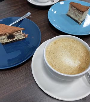 Tiramisu cake and latte at Plantmilkyway in Budapest