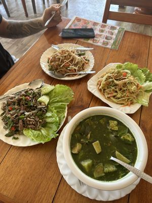 Laap / phad thai / papaya salad / veggie curry with mock fish  at Kapphet Vegan in Vang Vieng