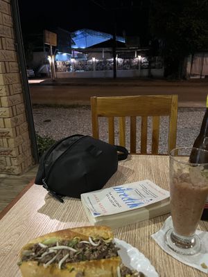 Not the best photo but this was the delicious vegan soy protein Larb sandwich in the softest, lightest baguette and a mixed smoothie on the side! Portions huge!  at Kapphet Vegan in Vang Vieng