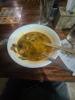 This is my food after I had finished. You can see to the right hand side some of the potatoes I've taken out and they're raw. at Kapphet Vegan in Vang Vieng