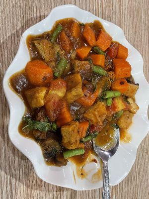 This was the sweet and sour tofu, but instead it was spicy made with chile in the sauce   at Kapphet Vegan in Vang Vieng