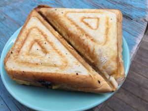 Vegan sausage, saurkraut and hash brown jaffle at For Change Cafe - Melbourne Uni. in Parkville