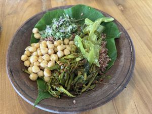 I’m unsure of the green vegetable dishes are but they were so good especially the one that looks like green capsicum   at Ranbath in Colombo