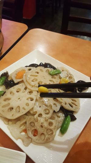Lotus root, fungus and ginkgo nut side (ginkgo nut in the chopsticks) at Enjoy Vegetarian Restaurant - Sunset District in San Francisco