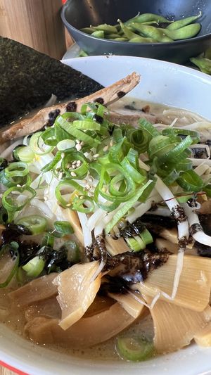 Vegan Classic Ramen with Edamame in the background, photo bombing  at Taro's Ramen in Ascot