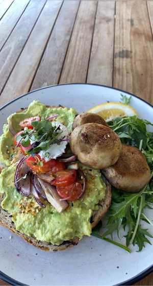 Smashed avo on sourdough with a side of mushrooms is what I ordered, but then she bought me “gourmet toast” which I was very pleased about - yummo!  at Gratitude in Tauranga
