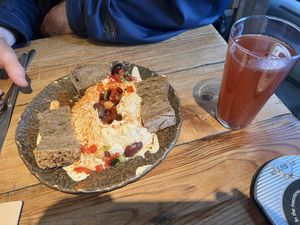 Hummus, sourdough bread with strawberry ginger lemonade   at Honest Greens - Plaça Catalunya in Barcelona