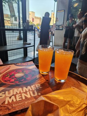 Carrot, Ginger and Turmeric drink  at Honest Greens - Plaça Catalunya in Barcelona