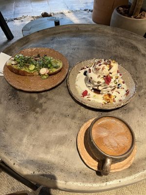 moccha + avocado bread + pistachio pancakes  at Honest Greens - Plaça Catalunya in Barcelona
