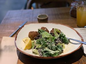Vegan Kale Cesar with falafel  at Honest Greens - Plaça Catalunya in Barcelona