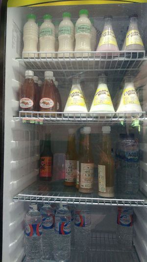 drinks cooler - almond mylk (with different flavours), turmeric jamu, tamarind jamu, etc. at Berkah Vegan in Dalung