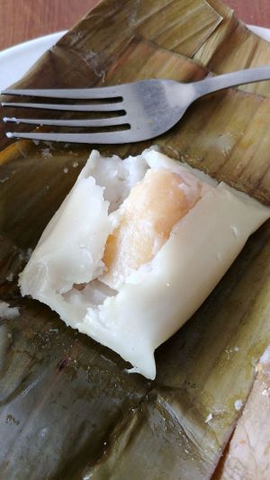 little dessert - the white "pudding" might be something like... glutinous rice flour?? the middle is a banana. at Berkah Vegan in Dalung