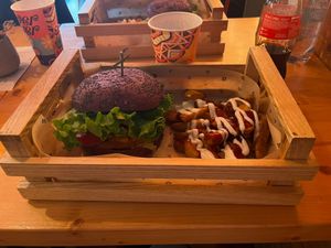 Cheesy Cecio with spicy sauce and wedges. Burger contains a chickpea patty and vegan cheddar cheese. at Flower Burger in Verona