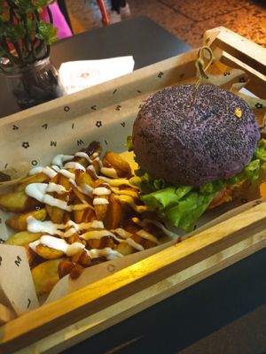 Purple cheesy with patatas buenas at Flower Burger in Verona