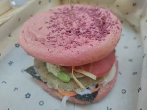 Japanese special burger with a rice patty. Lacked oomph at Flower Burger in Verona