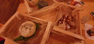 Tofu and black bun burger at Flower Burger in Verona