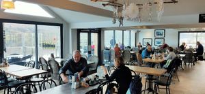 Inside with lake view at The Bluebird Café by the Lake in Coniston