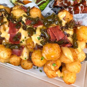 Filthy Tater Tots with added baecon, and candied jalapeños  at VGN Boulevard in Stourbridge