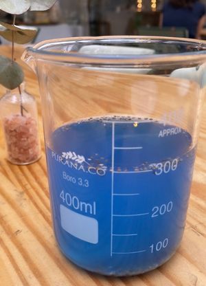 Suco (shot) delicioso. Bebida do céu ou algo assim. Recomendo.  at Purana in Sao Paulo