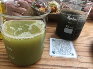 Green awakening juice and activated charcoal juice   at Purana in Sao Paulo