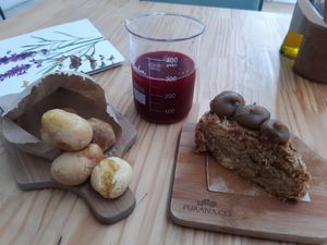 Pãezinhos do amor, torta de maçã e suco da terra. at Purana in Sao Paulo